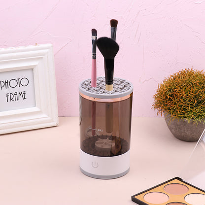 Brush cleaner machine removing eyeshadow from blending brush